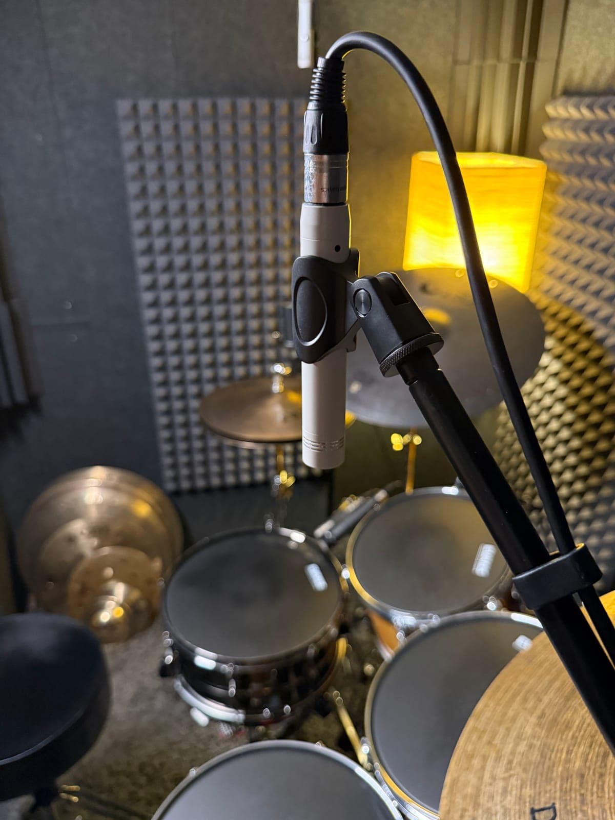 Microphones positioned over the kit in the Whisper Box
